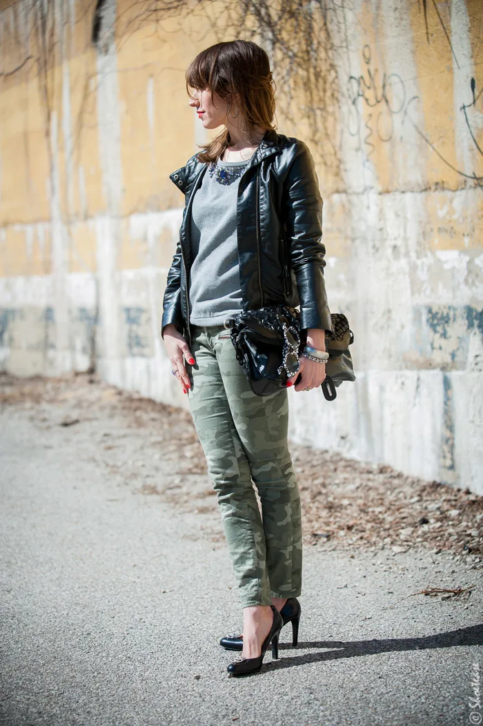 Toronto Street Style Fashion - Black Leather Biker Jacket, Camo pants, grey sweatshirt, black pumps with skull clips