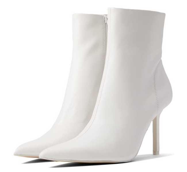 White leather stiletto heel sock ankle boot on white background.