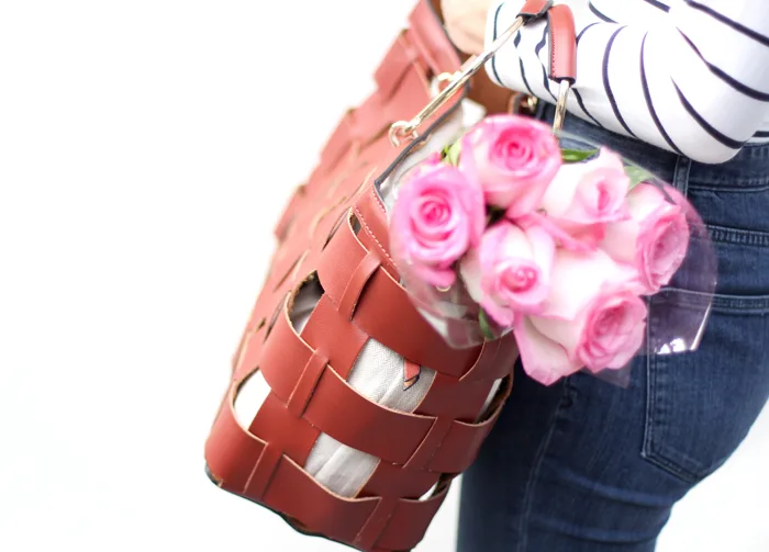 Brown weave purse with roses
