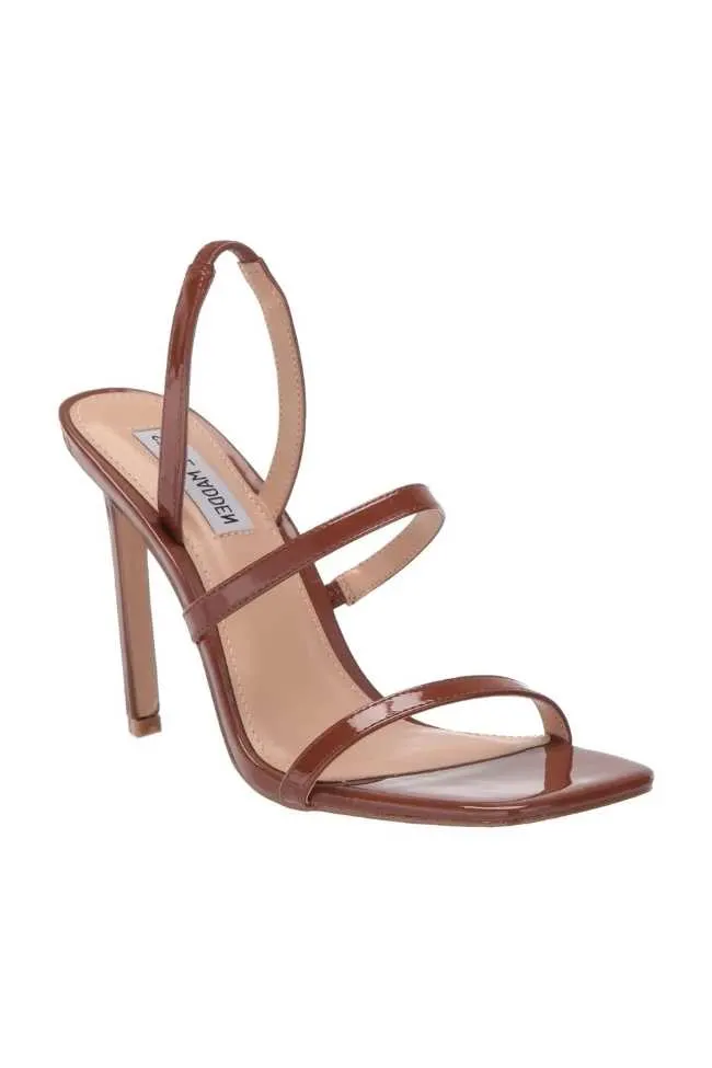 Steve Madden square toe minimal brown patent sandal with stiletto heel on white background.