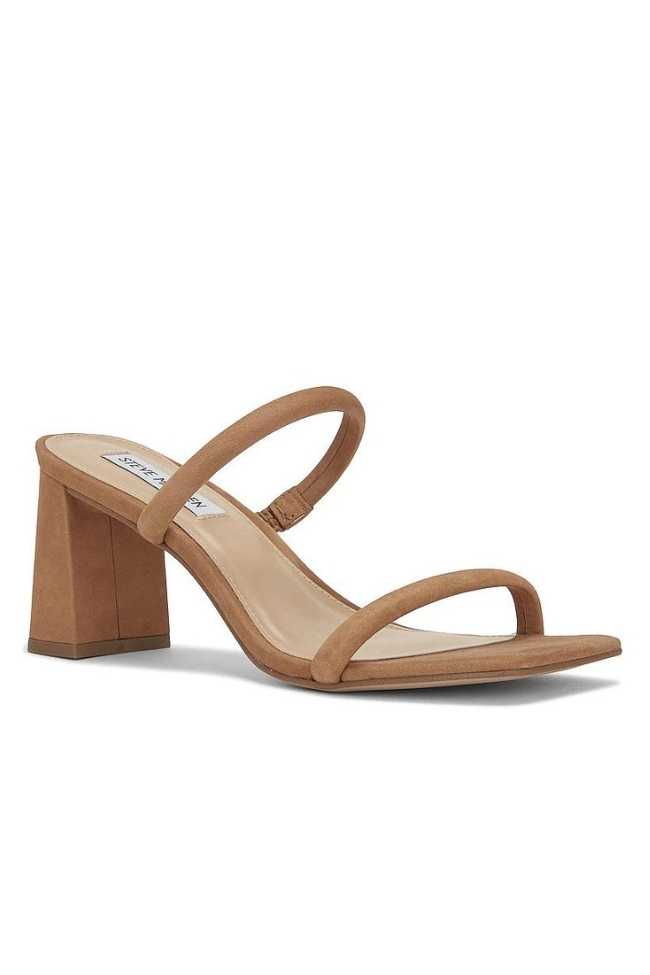 Steve Madden square heel minimal tan suede slide sandal with stiletto heel on white background.