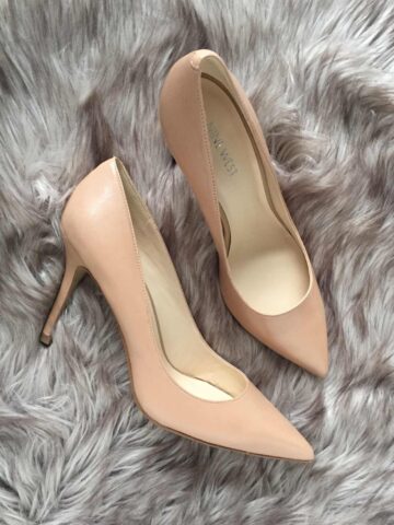 Blush Pumps Color Shoes that go with everything, laying on a taupe carpet.