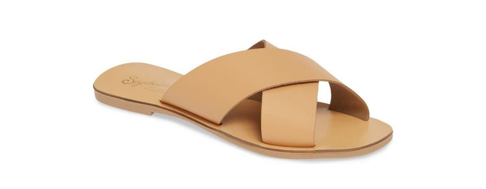 Tan slide sandals are women's shoes that go with everything.