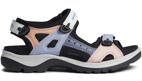 Pastel grey and black colored hiking sandals on white background.