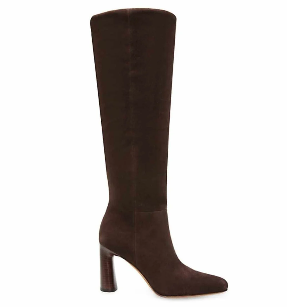 Dark brown suede knee boots with angled heel for capsule shoe wardrobe on white background.