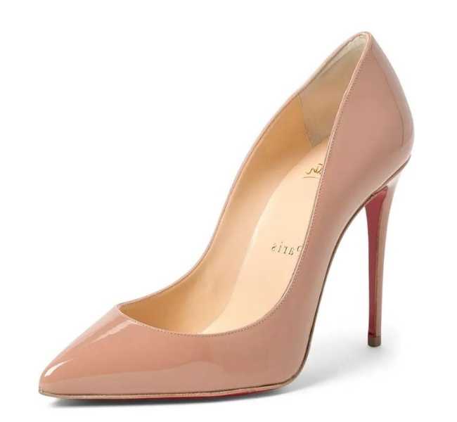 Blush nude leather pointed toe heel on white background.