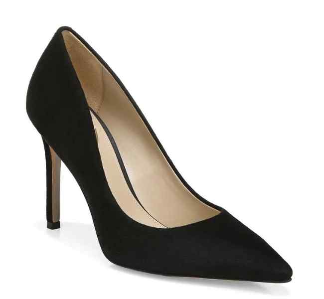 Black suede pointed toe pumps on white background.