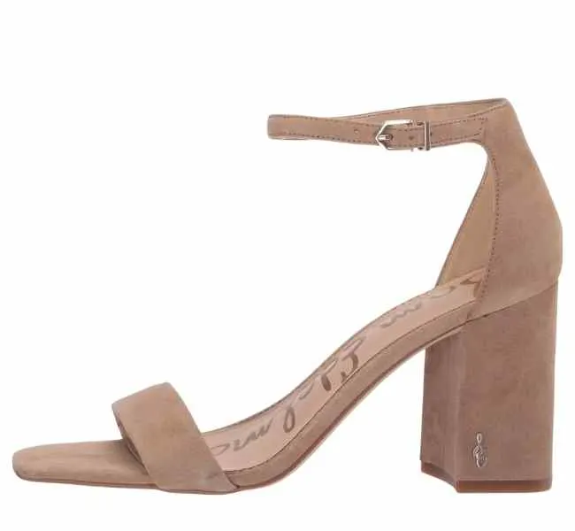 tan suede block heel sandals on white background.