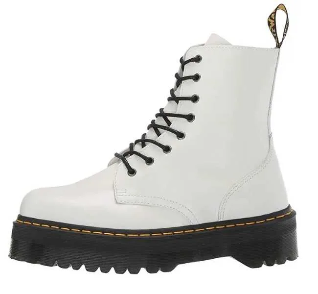 White lug sole combat boots on white background.