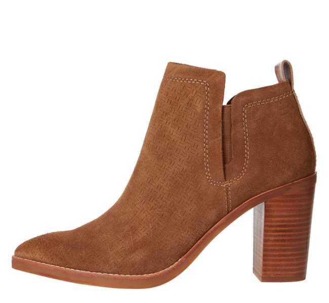 Brown ankle boot on white background.