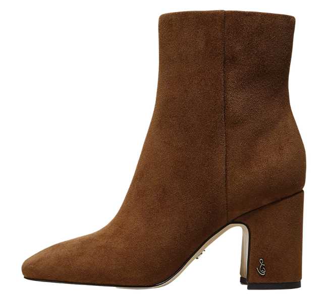 Brown ankle boot on white background.