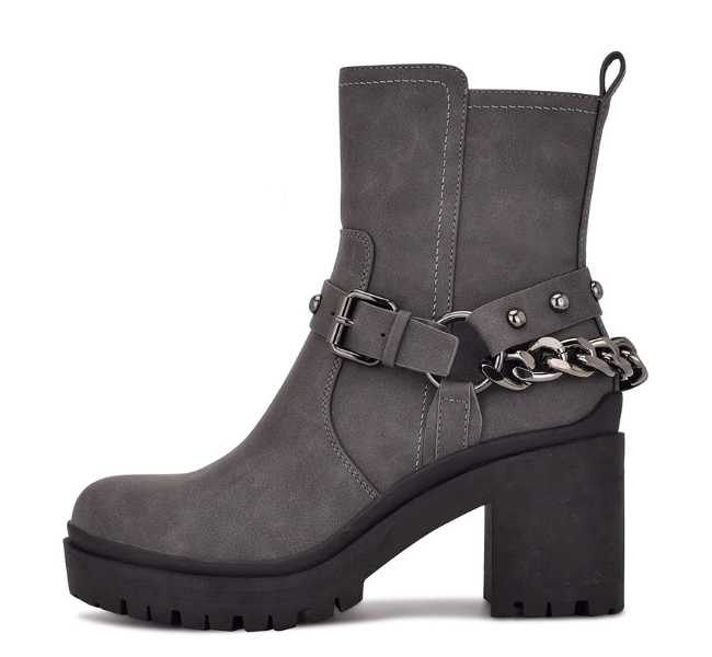 Grey upper black sole chunky ankle boot on white background.
