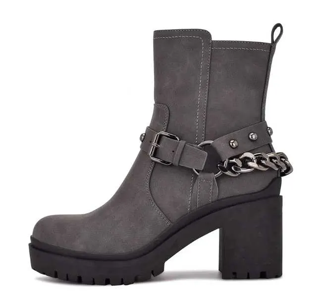 Grey upper black sole chunky ankle boot on white background.