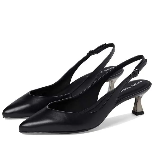 Black pointed toe buckle strap with slingback closure kitten heels on white background.