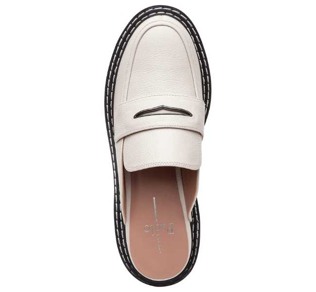 Beige slip on loafer on white background.