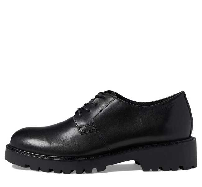Black leather lace up oxfords on white background.