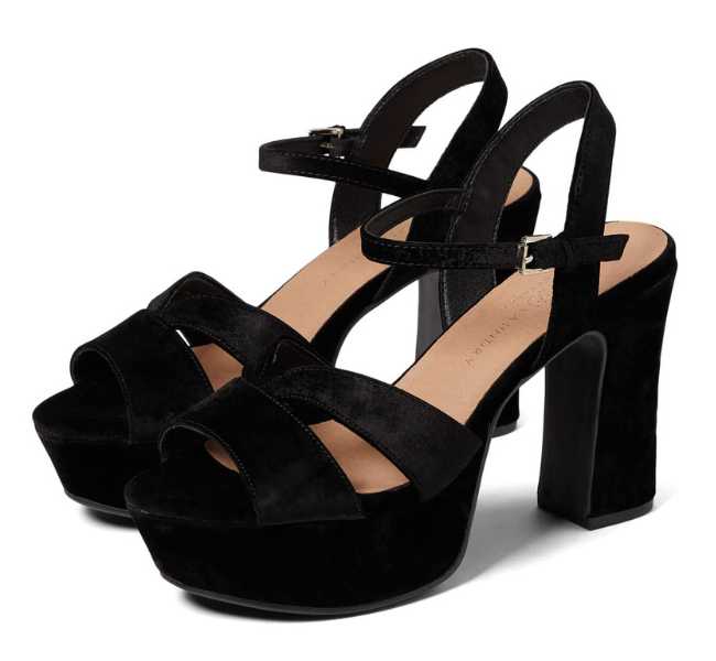 Black open toe ankle strap with buckle closure platform sandals on white background.