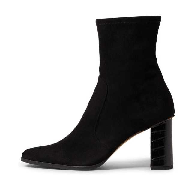 Black block heel boot on white background.