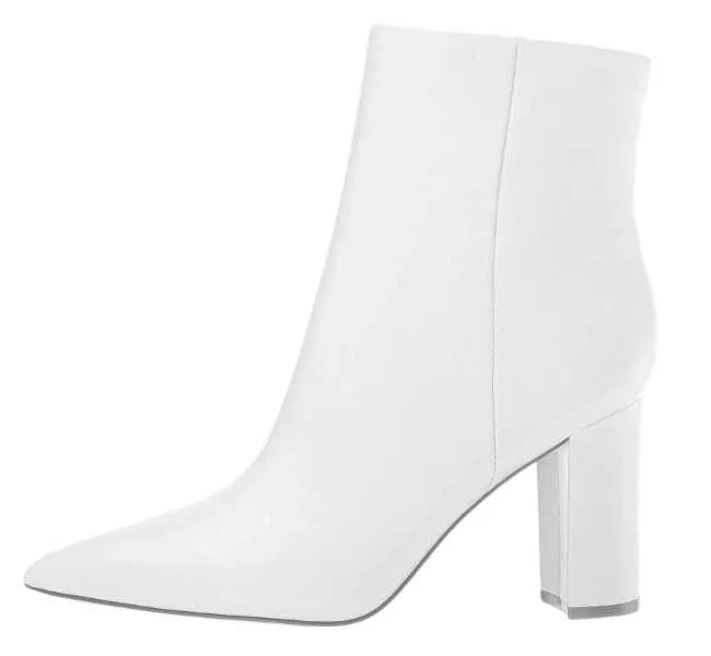 White pointed toe ankle boot on white background.