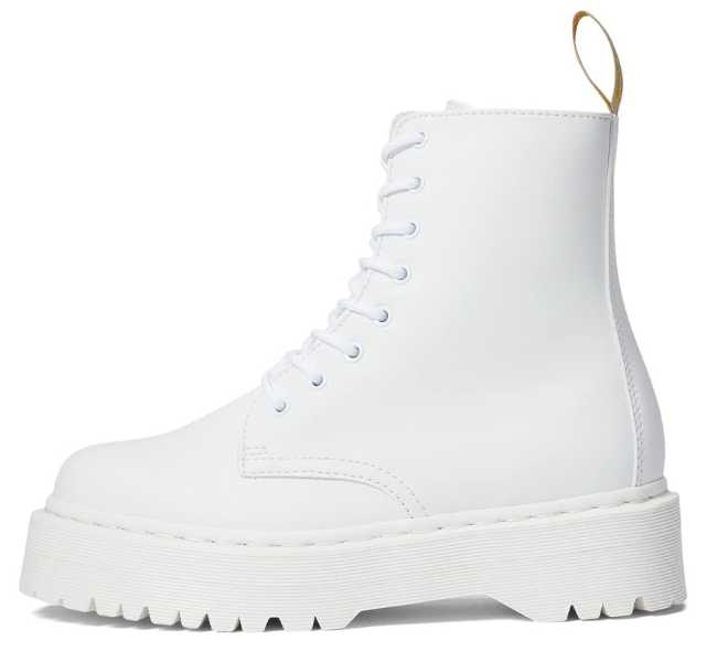 White lace up combat boot on white background.