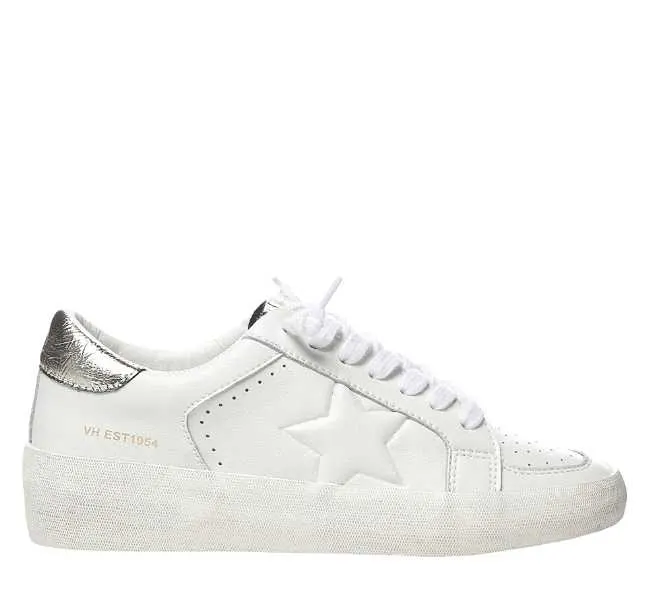 White with decorative perforation embossing and silver heel tab lace up sneaker on white background.