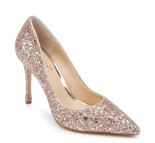 Glittery rose gold pointed toe heel on white background.