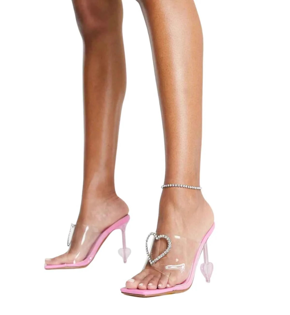 Pink square open toe heart heels with heart embellishments at the front and on the heel on white background.