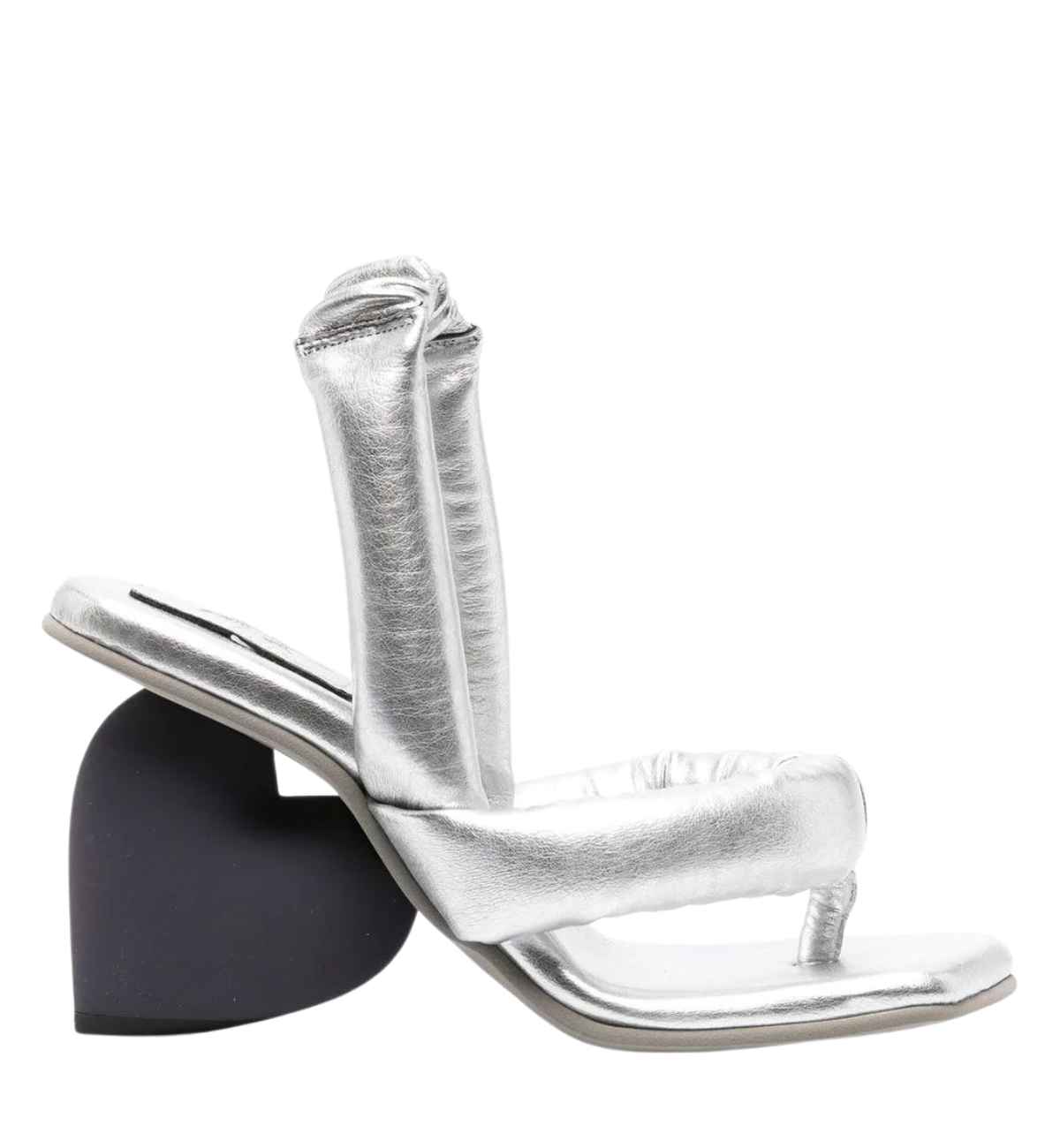 Metallic heart heel with black heart shaped heel on white background.