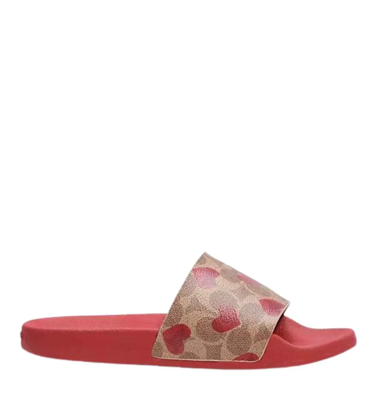 Red heart shoe with beige and red heart embroidered band on white background.
