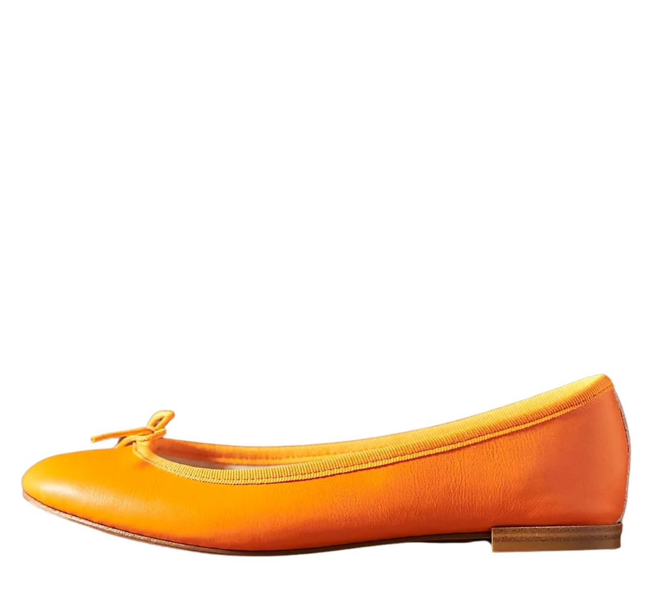 Orange ballerina flat on white background.